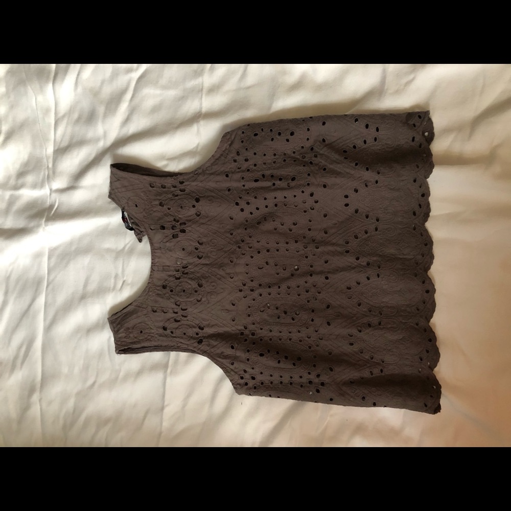 Grey shirt with floral pattern cut outs